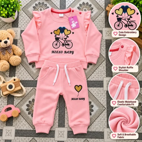 Pink Baby Outfit Showcase with Detail Insets